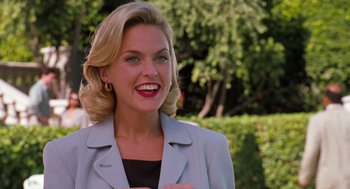 Movie still from “The Parent Trap” (1998), directed by Nancy Meyers – A woman with blonde hair wearing a jacket; Medium shot, Over the shoulder angle