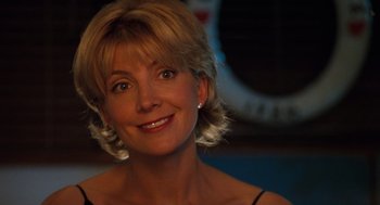 Movie still from “The Parent Trap” (1998), directed by Nancy Meyers – A person smiling for a picture; Close Up shot, Over the shoulder angle