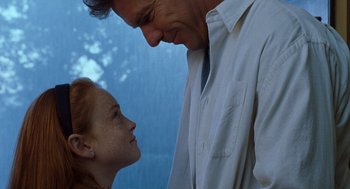 Movie still from “The Parent Trap” (1998), directed by Nancy Meyers – A man and a woman looking at each other's face; Close Up shot, Low angle