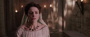 Movie still from “The Passion of the Christ” (2004), directed by Mel Gibson – A person wearing a necklace; Close Up shot, Low angle