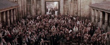 Movie still from “The Passion of the Christ” (2004), directed by Mel Gibson – A large group of people in robes and headbands; Extreme Wide shot, High angle
