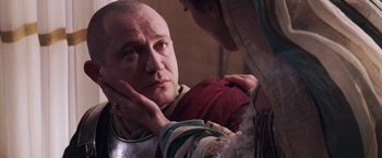 Movie still from “The Passion of the Christ” (2004), directed by Mel Gibson – An older man is looking at a younger woman; Close Up shot, Over the shoulder angle