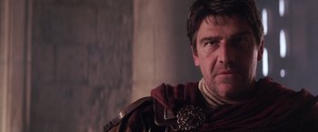 Movie still from “The Passion of the Christ” (2004), directed by Mel Gibson – A person wearing a suit of armor; Close Up shot, Low angle