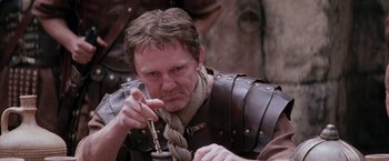 Movie still from “The Passion of the Christ” (2004), directed by Mel Gibson – A person holding a key; Close Up shot, Low angle