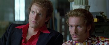 Movie still from “The People vs. Larry Flynt” (1996), directed by Milos Forman – A couple of men standing next to each other; Close Up shot, Over the shoulder angle