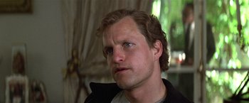 Movie still from “The People vs. Larry Flynt” (1996), directed by Milos Forman – A person wearing a black jacket; Close Up shot, Low angle