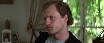 Movie still from “The People vs. Larry Flynt” (1996), directed by Milos Forman – A person wearing a black jacket; Close Up shot, Low angle