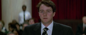 Movie still from “The People vs. Larry Flynt” (1996), directed by Milos Forman – A person wearing a suit and tie; Close Up shot, Low angle