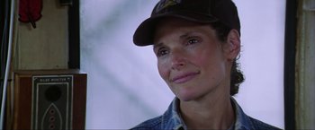 Movie still from “The Perfect Storm” (2000), directed by Wolfgang Petersen – A person wearing a hat; Close Up shot, Over the shoulder angle