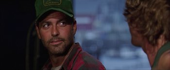 Movie still from “The Perfect Storm” (2000), directed by Wolfgang Petersen – A person wearing a hat; Close Up shot, Low angle