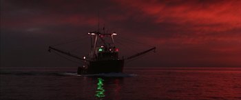 Movie still from “The Perfect Storm” (2000), directed by Wolfgang Petersen – A large boat in the water at night; Extreme Wide shot, Low angle