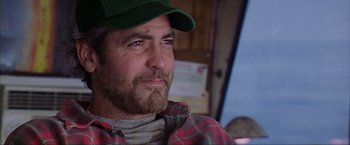 Movie still from “The Perfect Storm” (2000), directed by Wolfgang Petersen – A person wearing a hat; Close Up shot, Low angle