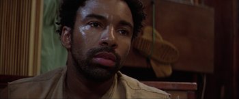 Movie still from “The Perfect Storm” (2000), directed by Wolfgang Petersen – A person with a beard; Close Up shot, Low angle