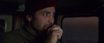 Movie still from “The Perfect Storm” (2000), directed by Wolfgang Petersen – A person wearing a hat; Close Up shot, Low angle