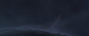 Movie still from “The Perfect Storm” (2000), directed by Wolfgang Petersen – A sailboat in the middle of the ocean at night; Extreme Wide shot, Low angle