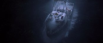 Movie still from “The Perfect Storm” (2000), directed by Wolfgang Petersen – An aerial view of a boat in the water; Extreme Wide shot, Overhead angle