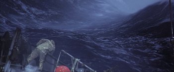 Movie still from “The Perfect Storm” (2000), directed by Wolfgang Petersen – A boat in the ocean with a lot of waves; Extreme Wide shot, Overhead angle