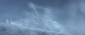 Movie still from “The Perfect Storm” (2000), directed by Wolfgang Petersen – A boat is in the water in the middle of the ocean; Extreme Wide shot, High angle