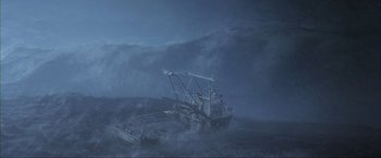 Movie still from “The Perfect Storm” (2000), directed by Wolfgang Petersen – A boat in the water in the middle of the night; Extreme Wide shot, Low angle