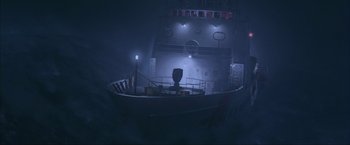Movie still from “The Perfect Storm” (2000), directed by Wolfgang Petersen – A boat in the middle of the night in the fog; Extreme Wide shot, Low angle