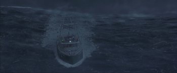Movie still from “The Perfect Storm” (2000), directed by Wolfgang Petersen – A boat in the middle of the ocean at night; Extreme Wide shot, High angle