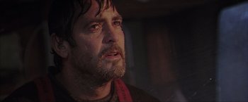 Movie still from “The Perfect Storm” (2000), directed by Wolfgang Petersen – A person with a beard; Close Up shot, Low angle