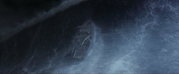 Movie still from “The Perfect Storm” (2000), directed by Wolfgang Petersen – A boat in the middle of the ocean in the dark; Extreme Wide shot, Overhead angle