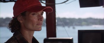 Movie still from “The Perfect Storm” (2000), directed by Wolfgang Petersen – A person wearing a red hat; Close Up shot, Low angle