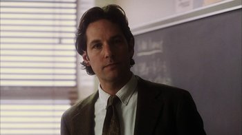 Movie still from “The Perks of Being a Wallflower” (2012), directed by Stephen Chbosky – A man in a suit and a tie; Close Up shot, Low angle