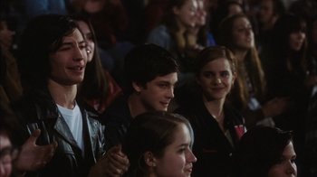 Movie still from “The Perks of Being a Wallflower” (2012), directed by Stephen Chbosky – A group of young people sitting in a crowd; Medium shot, Over the shoulder angle