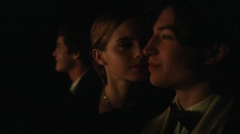 Movie still from “The Perks of Being a Wallflower” (2012), directed by Stephen Chbosky – A man and a woman kissing in a dark room; Close Up shot, Over the shoulder angle