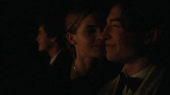 Movie still from “The Perks of Being a Wallflower” (2012), directed by Stephen Chbosky – A man and a woman kissing in the dark; Close Up shot, Over the shoulder angle