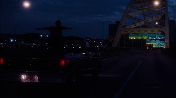 Movie still from “The Perks of Being a Wallflower” (2012), directed by Stephen Chbosky – A truck driving down a street at night; Extreme Wide shot, Low angle