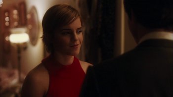 Movie still from “The Perks of Being a Wallflower” (2012), directed by Stephen Chbosky – A woman in a red dress looking at a man in a black suit; Close Up shot, Over the shoulder angle