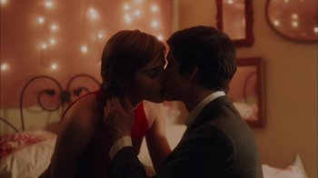 Movie still from “The Perks of Being a Wallflower” (2012), directed by Stephen Chbosky – A man and a woman kissing each other in front of a mirror; Close Up shot, Low angle