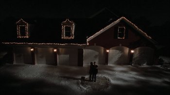 Movie still from “The Perks of Being a Wallflower” (2012), directed by Stephen Chbosky – Two people standing in the snow in front of a house; Extreme Wide shot, Overhead angle