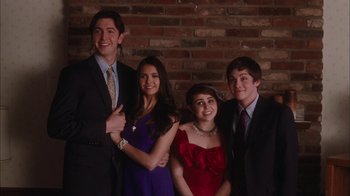 Movie still from “The Perks of Being a Wallflower” (2012), directed by Stephen Chbosky – A group of young people posing for a picture; Medium shot, Low angle