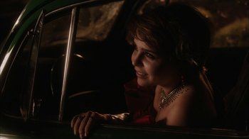 Movie still from “The Perks of Being a Wallflower” (2012), directed by Stephen Chbosky – A woman sitting in the back seat of a car; Close Up shot, Over the shoulder angle