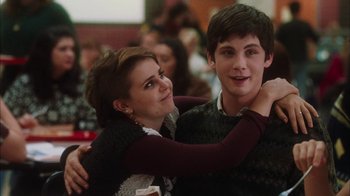 Movie still from “The Perks of Being a Wallflower” (2012), directed by Stephen Chbosky – A young man and a young woman hugging each other; Medium shot, Over the shoulder angle