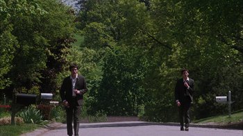 Movie still from “The Perks of Being a Wallflower” (2012), directed by Stephen Chbosky – A couple of men walking down a street; Extreme Wide shot, Low angle