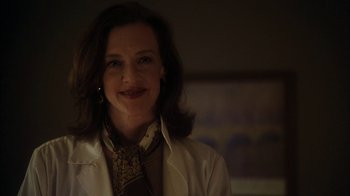 Movie still from “The Perks of Being a Wallflower” (2012), directed by Stephen Chbosky – A woman in a white lab coat smiling for the camera; Close Up shot, Low angle