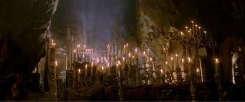 Movie still from “The Phantom of the Opera” (2004), directed by Joel Schumacher – Many lit candles in a room; Extreme Wide shot, High angle
