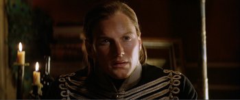 Movie still from “The Phantom of the Opera” (2004), directed by Joel Schumacher – A person with long blonde hair; Close Up shot, High angle