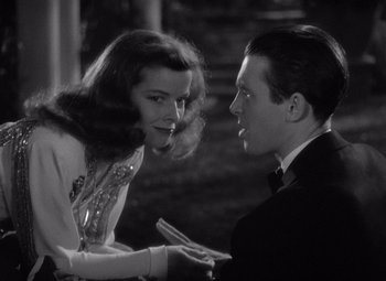 Movie still from “The Philadelphia Story” (1940), directed by George Cukor – A man and a woman talking to each other; Close Up shot, Over the shoulder angle