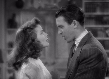 Movie still from “The Philadelphia Story” (1940), directed by George Cukor – A man and a woman standing next to each other; Close Up shot, High angle