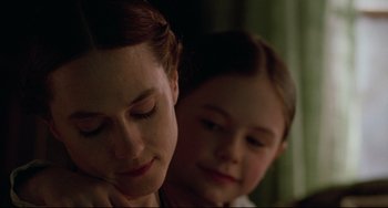 Movie still from “The Piano” (1993), directed by Jane Campion – A woman and a child looking at each other; Close Up shot, Over the shoulder angle