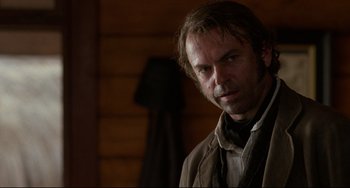 Movie still from “The Piano” (1993), directed by Jane Campion – A person wearing a jacket; Close Up shot, Over the shoulder angle