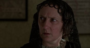 Movie still from “The Piano” (1993), directed by Jane Campion – A person wearing a veil; Close Up shot, Over the shoulder angle
