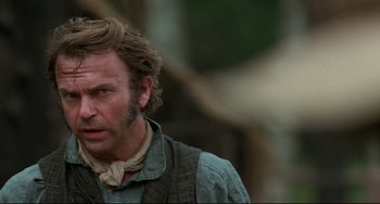 Movie still from “The Piano” (1993), directed by Jane Campion – A person with a beard; Close Up shot, Over the shoulder angle