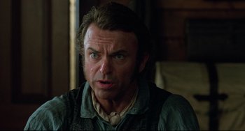 Movie still from “The Piano” (1993), directed by Jane Campion – A person wearing a vest; Close Up shot, Over the shoulder angle